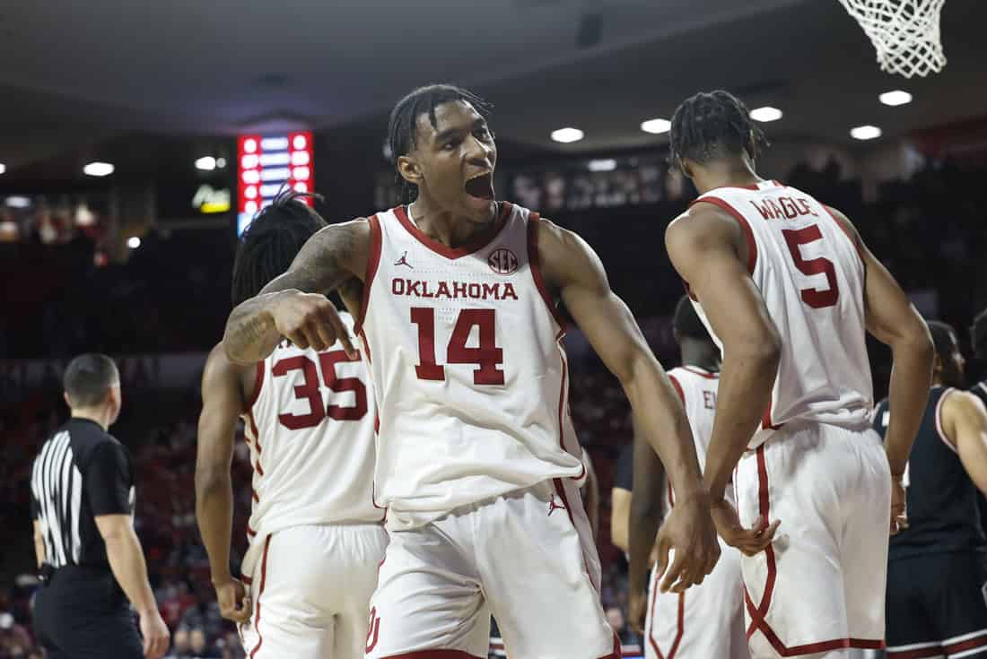 NCAAB 4 Razorbacks Players celebrating