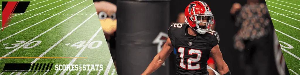 Atlanta Falcons vs Carolina Panthers Picks and Predictions January 5th 2025 3 A football player in a black jersey with red accents celebrates on the field, surrounded by green turf and football markings.