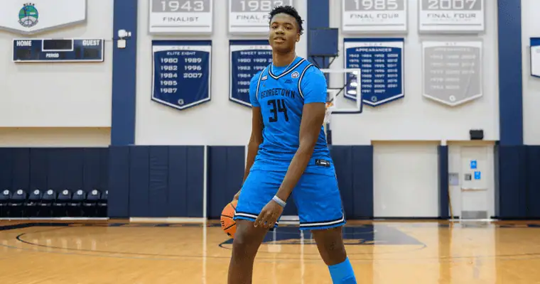 St. John's Red Storm vs Georgetown Hoyas Picks and Predictions January 14th 2025 3 Georgetown Hoyas basketball player wearing number 34, possibly relevant to sports fans