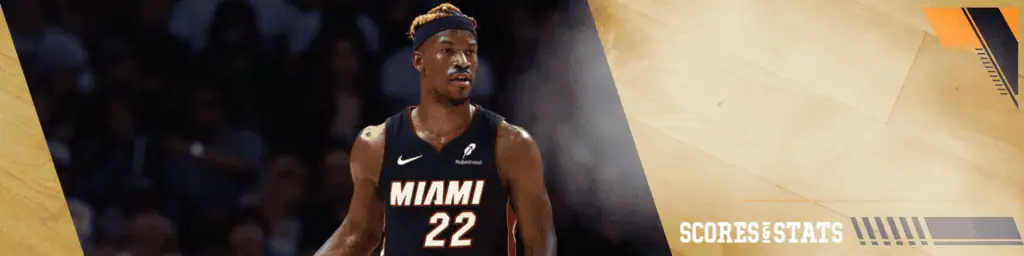 Sacramento Kings vs Miami Heat Picks and Predictions January 6th 2025 2 Miami Heat player Jimmy Butler wearing a black jersey with number 22, standing on the court during a game.