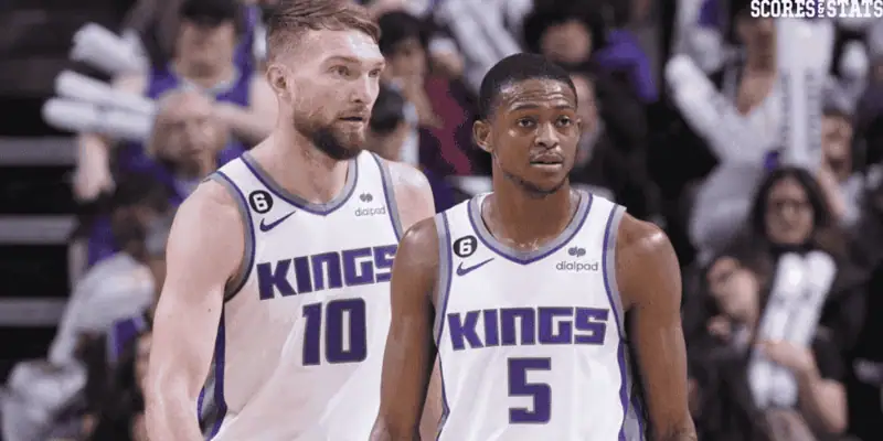 Sacramento Kings vs Memphis Grizzlies Picks and Predictions January 3rd 2025 2 Sacramento Kings basketball players in white jerseys standing on the court during a game
