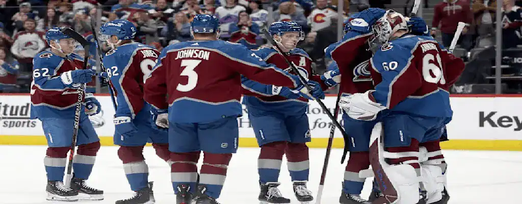 New York Islanders vs Colorado Avalanche Picks and Predictions January 28th 2025 2 Colorado Avalanche players celebrate together on the ice during NHL game