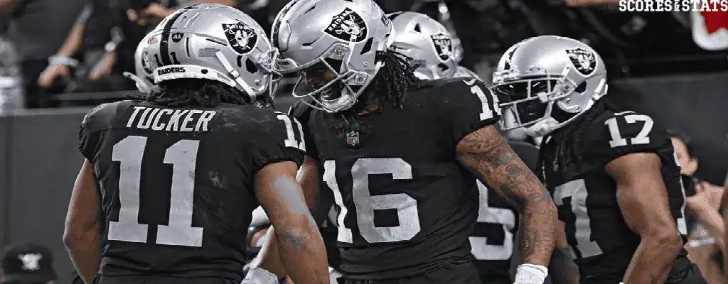 Las Vegas Raiders vs Los Angeles Chargers Picks and Predictions January 5th 2025 3 Las Vegas Raiders players celebrate during an NFL game wearing silver and black helmets