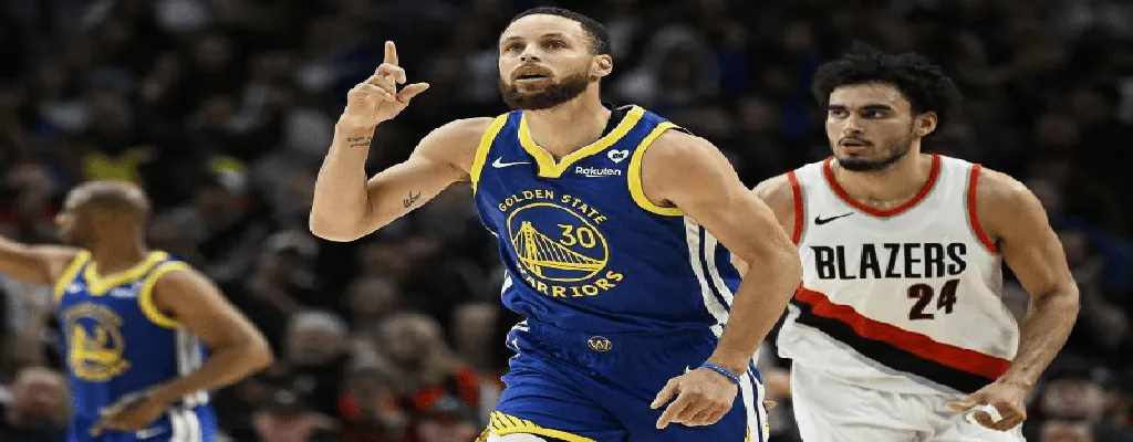 Golden State Warriors vs Utah Jazz Picks and Predictions January 28th 2025 2 Stephen Curry celebrates during Golden State Warriors vs Portland Trail Blazers NBA game