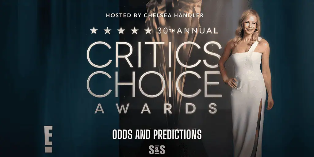 A woman in a sleek, white gown stands beside a tall trophy, promoting the 30th Annual Critics Choice Awards hosted by Chelsea Handler.