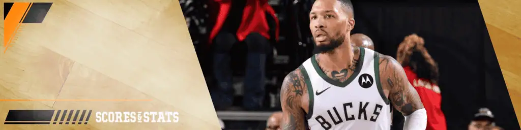 Minnesota Timberwolves vs Milwaukee Bucks Picks and Predictions February 12th 2025 2 Damian Lillard of the Milwaukee Bucks focused during gameplay, wearing a white jersey with green trim and the Bucks logo