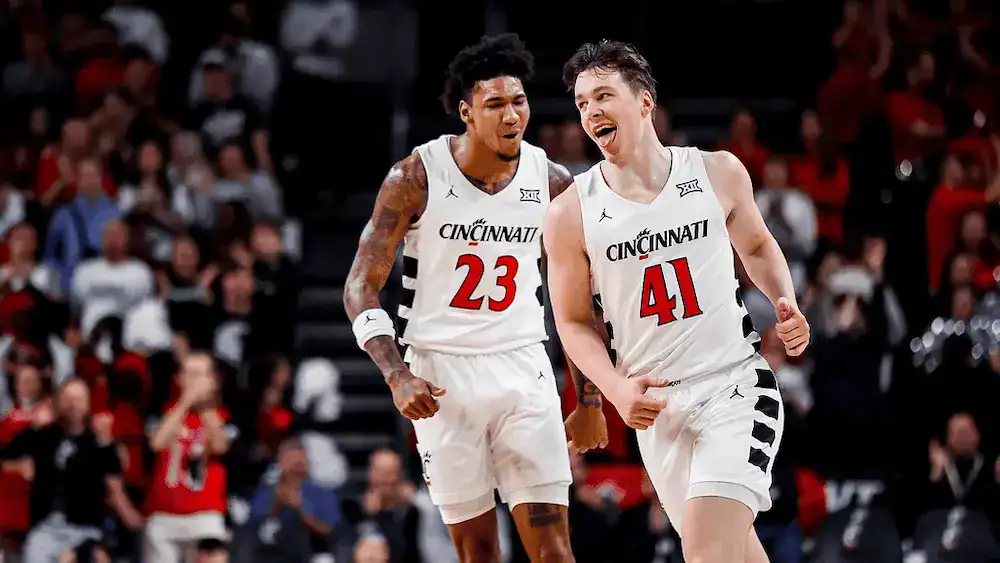 Iowa State Cyclones vs Cincinnati Bearcats Picks and Predictions February 15th 2025 2 cincinnati basketball players