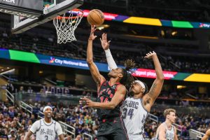 Raptors player making a layup