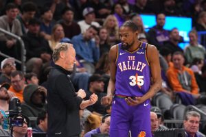 Suns Player talking to coach