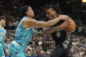 Spurs Player Guarding the ball