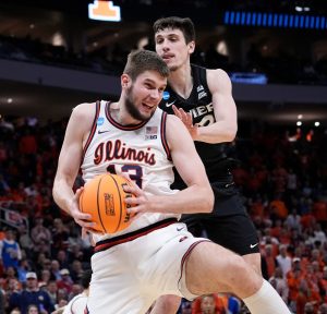 Illlinois Player Guarding the ball