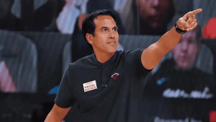 Miami Heat vs New York Knicks Picks and Predictions March 2nd 2025 4 Miami Heat head coach Erik Spoelstra pointing during a game, wearing a “Coaches for Racial Justice” badge.
