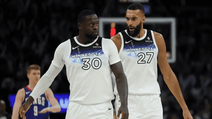 Phoenix-suns vs Minnesota Timberwolves Picks and Predictions March 2nd 2025 2 Minnesota Timberwolves players wearing white jerseys, number 30 and 27, focused during an NBA game.