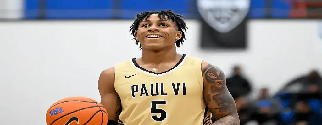  Paul VI High School basketball player smiling during a game