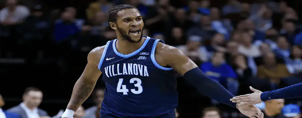 Villanova basketball player celebrates during NCAA game