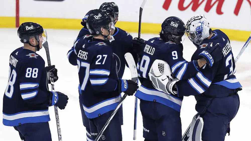 New York Islanders vs Winnipeg Jets Picks and Predictions March 4th 2025 2 winnipeg jets huddle