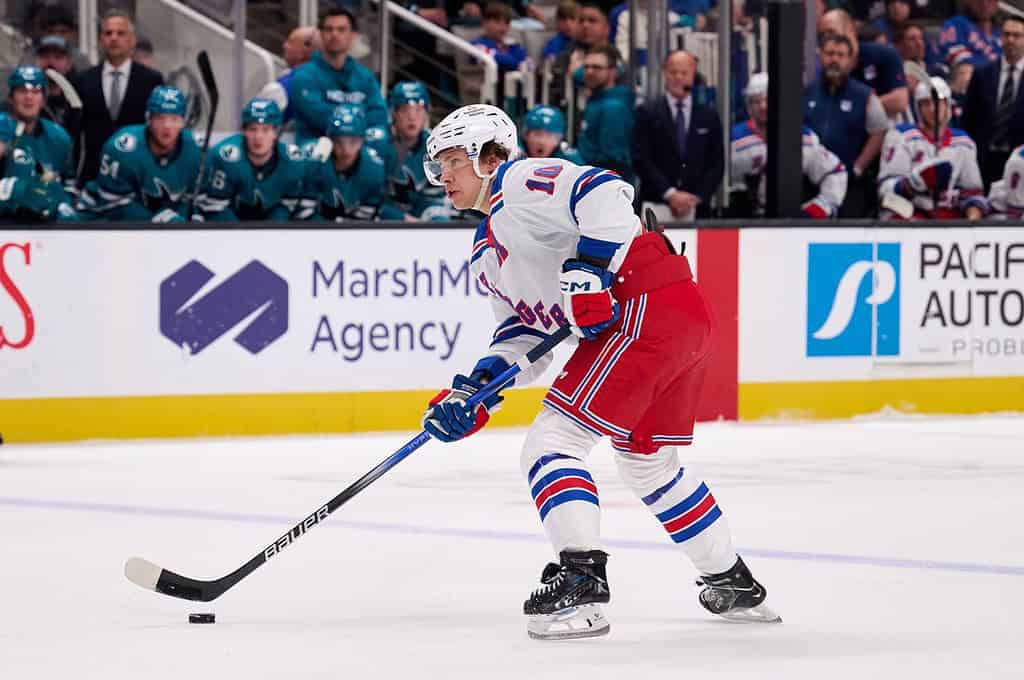 Rangers player Dribbling the puck alone