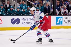Rangers player Dribbling the puck alone