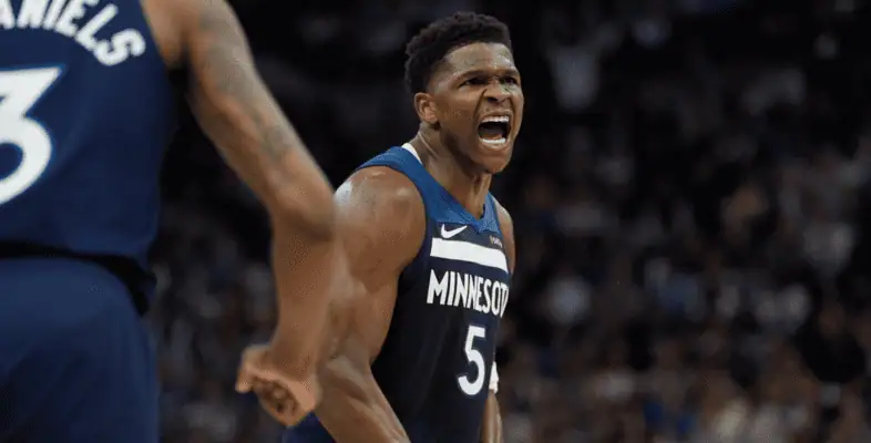 Los Angeles Lakers vs Minnesota Timberwolves Picks and Predictions April 30th 2025 2 Anthony Edwards of the Minnesota Timberwolves in a navy blue jersey (#5), yelling with intensity during a game