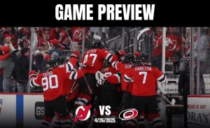 Celebrating players in red jerseys gather on the ice, cheering with excited fans visible in the background. Game preview text displayed above.
