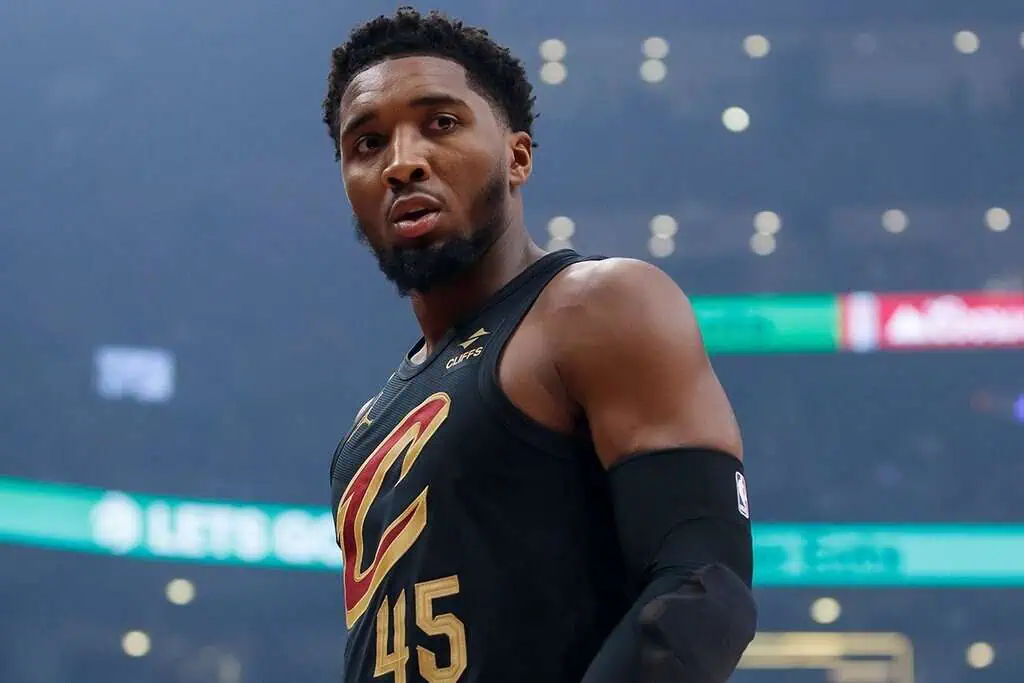 Miami Heat vs Cleveland-cavaliers Picks and Predictions April 26th 2025 2 A basketball player in a black Cavs jersey with the number 45 stands confidently.