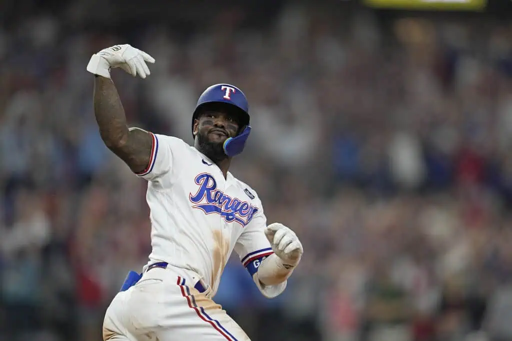 Chicago White Sox vs Texas Rangers Picks and Predictions May 23rd 2025 2 A baseball player in a Texas Rangers uniform celebrates a successful play