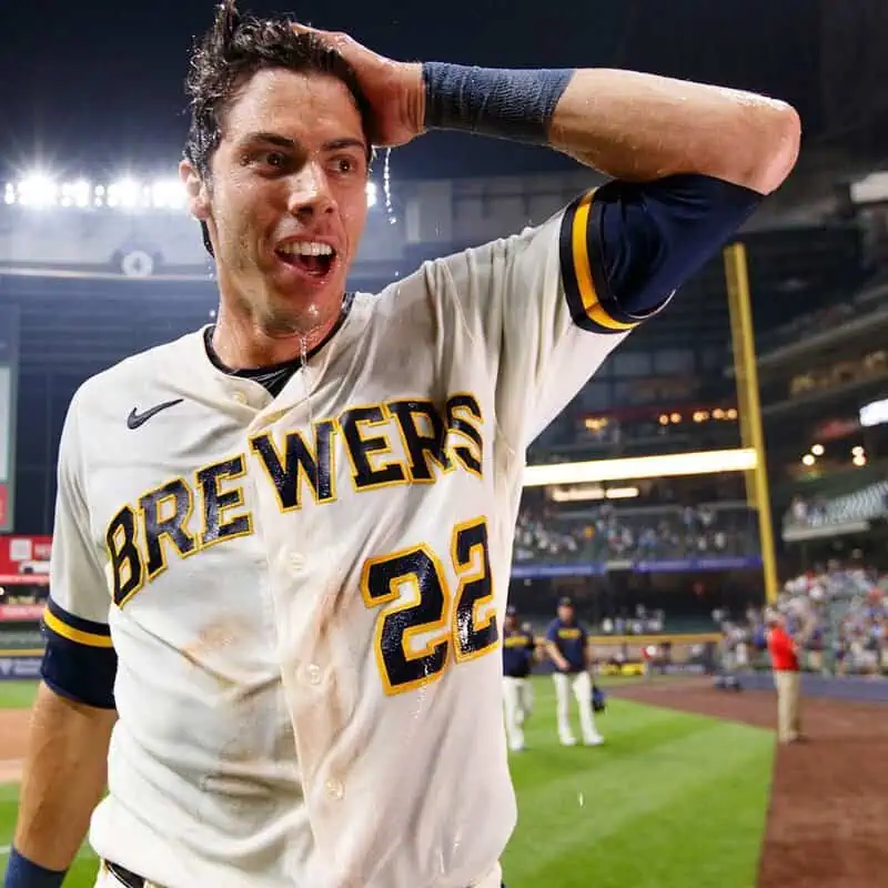 Milwaukee Brewers vs Houston Astros Picks and Predictions May 5th 2025 2 A Milwaukee Brewers player with sweat-drenched uniform wipes his forehead, celebrating after a game