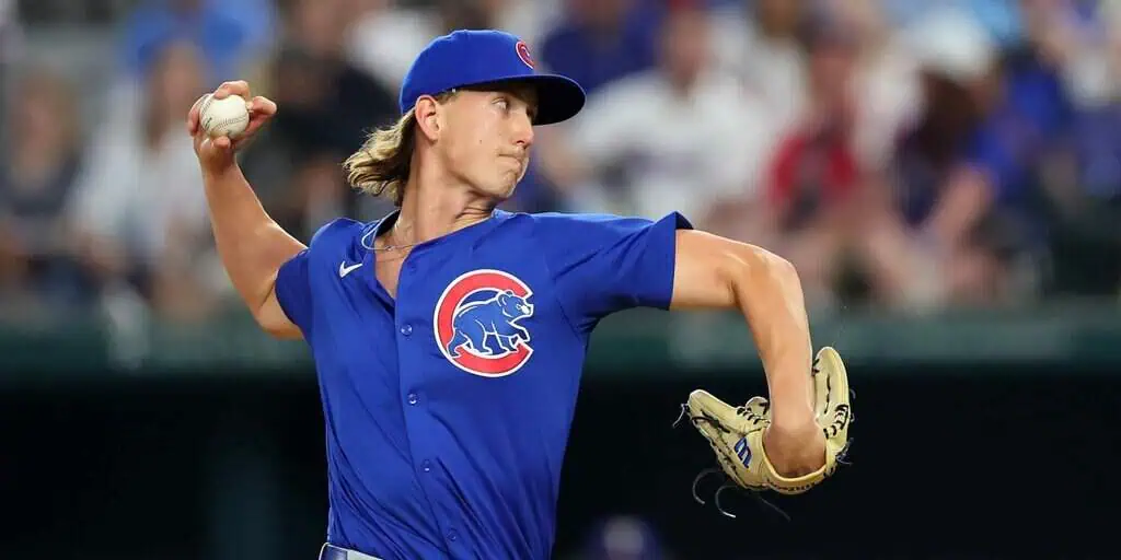Milwaukee Brewers vs Chicago Cubs Picks and Predictions May 2nd 2025 2 A baseball player in a blue Chicago Cubs jersey winds up to pitch, gripping a baseball in his throwing hand