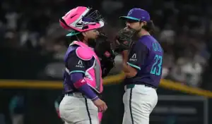 Arizona Diamondbacks catcher and pitcher discuss strategy during game against St. Louis Cardinals on May 23, 2025.