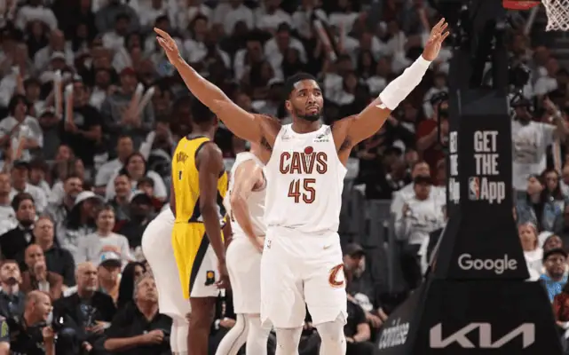 Indiana Pacers vs Cleveland-cavaliers Picks and Predictions May 9th 2025 2 Donovan Mitchell raises arms during Cavaliers game vs Pacers