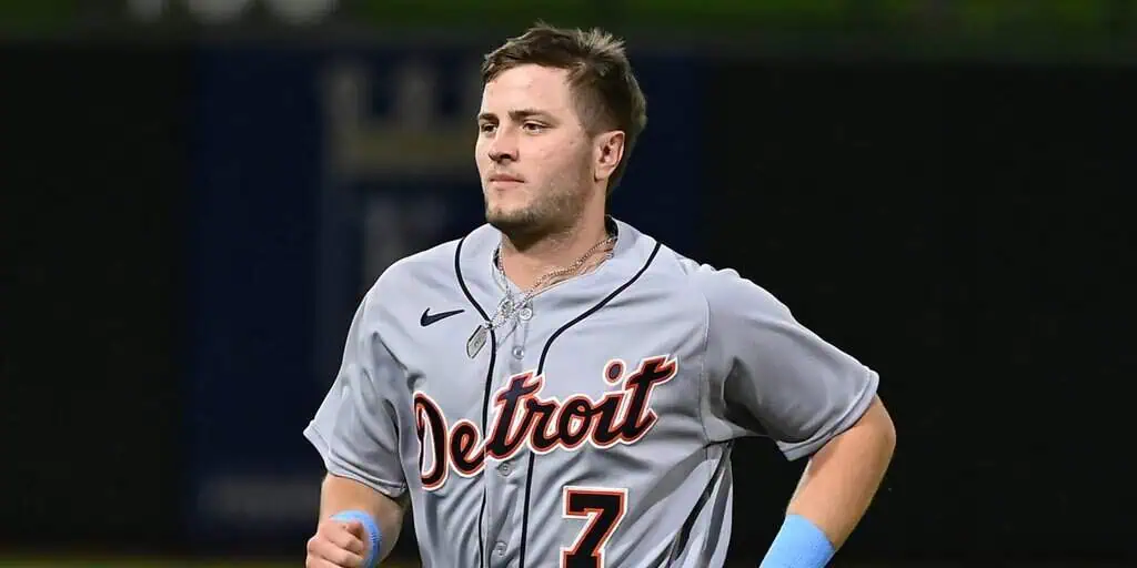 Toronto Blue Jays vs Detroit Tigers Picks and Predictions May 16th 2025 2 A player in a gray Detroit Tigers jersey with the number 7 runs on a baseball field, showcasing the team's logo prominently.
