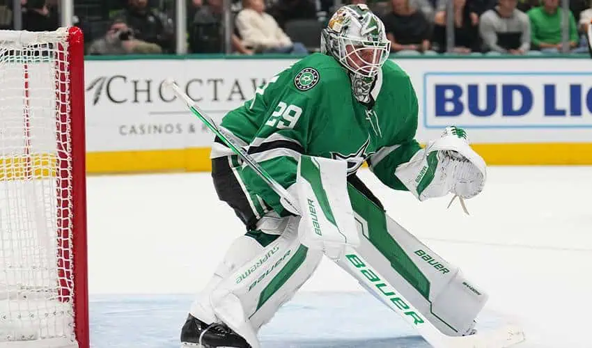 Colorado Avalanche vs Dallas Stars Picks and Predictions May 1st 2025 2 A hockey goalie in a green jersey with number 29 prepares to block a shot, poised in front of the net on the ice rink.