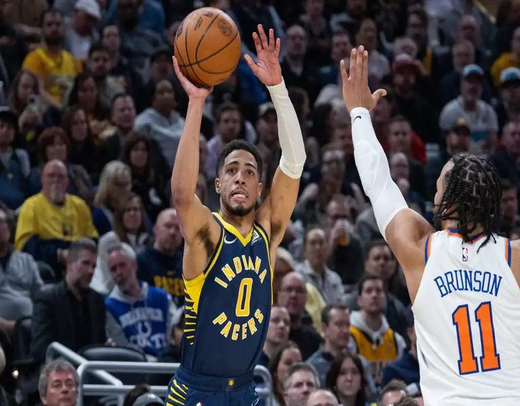 Indiana Pacers player shoots over Knicks defender during game on May 21, 2025.