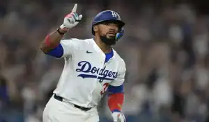 Los Angeles Dodgers player celebrates after scoring during game against New York Mets on May 23, 2025.