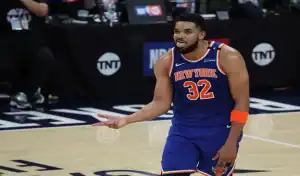 Knicks player reacts during NBA game vs Pacers