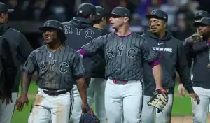 New York Mets players celebrate after game against White Sox