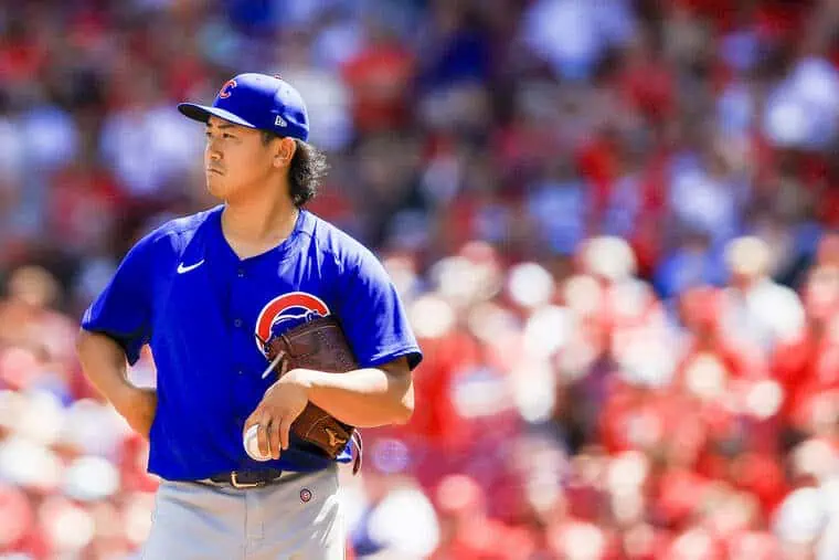Milwaukee Brewers vs Chicago Cubs Picks and Predictions May 4th 2025 2 A pitcher wearing a blue Chicago Cubs jersey stands on the mound, holding a baseball glove