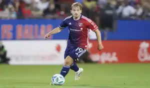 FC Dallas player dribbles the ball during match against Seattle Sounders FC on May 24, 2025.