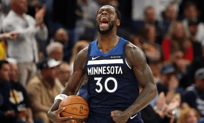 Golden State Warriors vs Minnesota Timberwolves Picks and Predictions May 12th 2025 2 Minnesota Timberwolves player yells while holding basketball during game