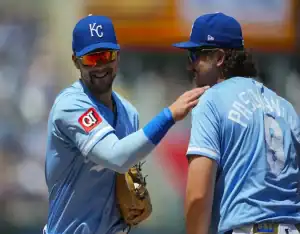 Kansas City Royals players share a laugh during May 14, 2025 MLB game vs Houston Astros