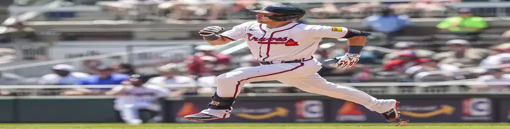 Atlanta Braves vs Boston Red Sox Picks and Predictions May 30th 2025 3 Atlanta Braves player sprinting towards first base during a daytime game.