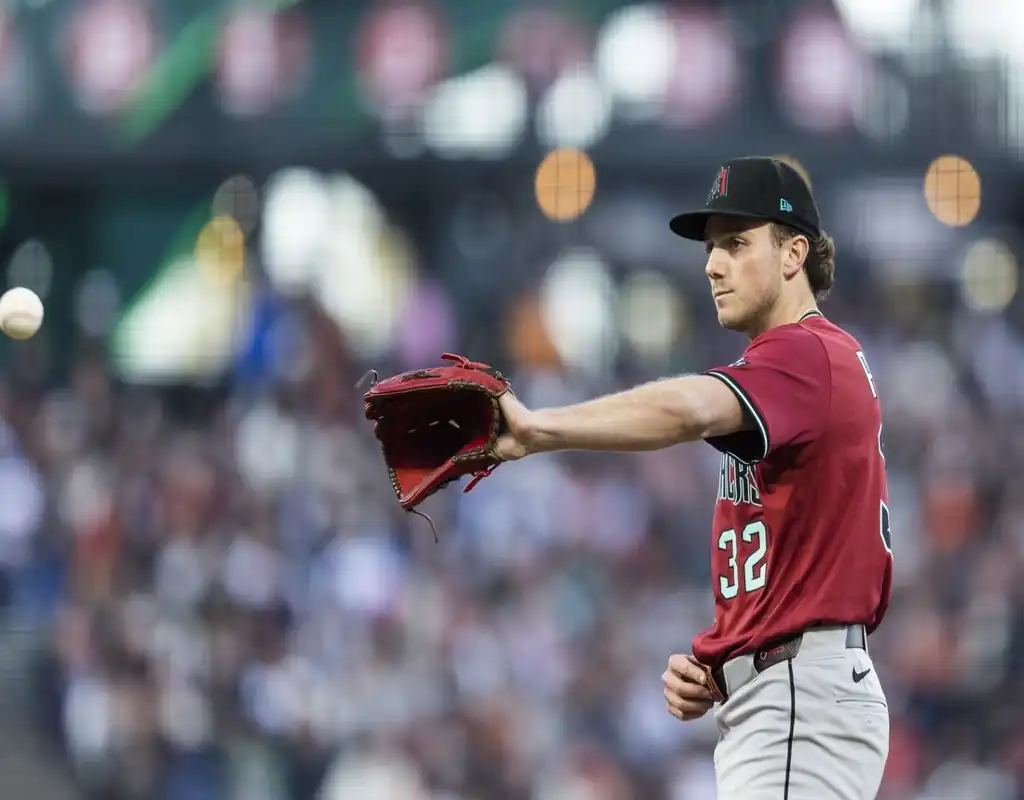 Arizona Diamondbacks pitcher prepares to catch the ball during the game against Los Angeles Dodgers on May 19, 2025