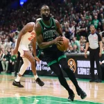 Boston Celtics guard drives to the basket against New York Knicks on May 16, 2025