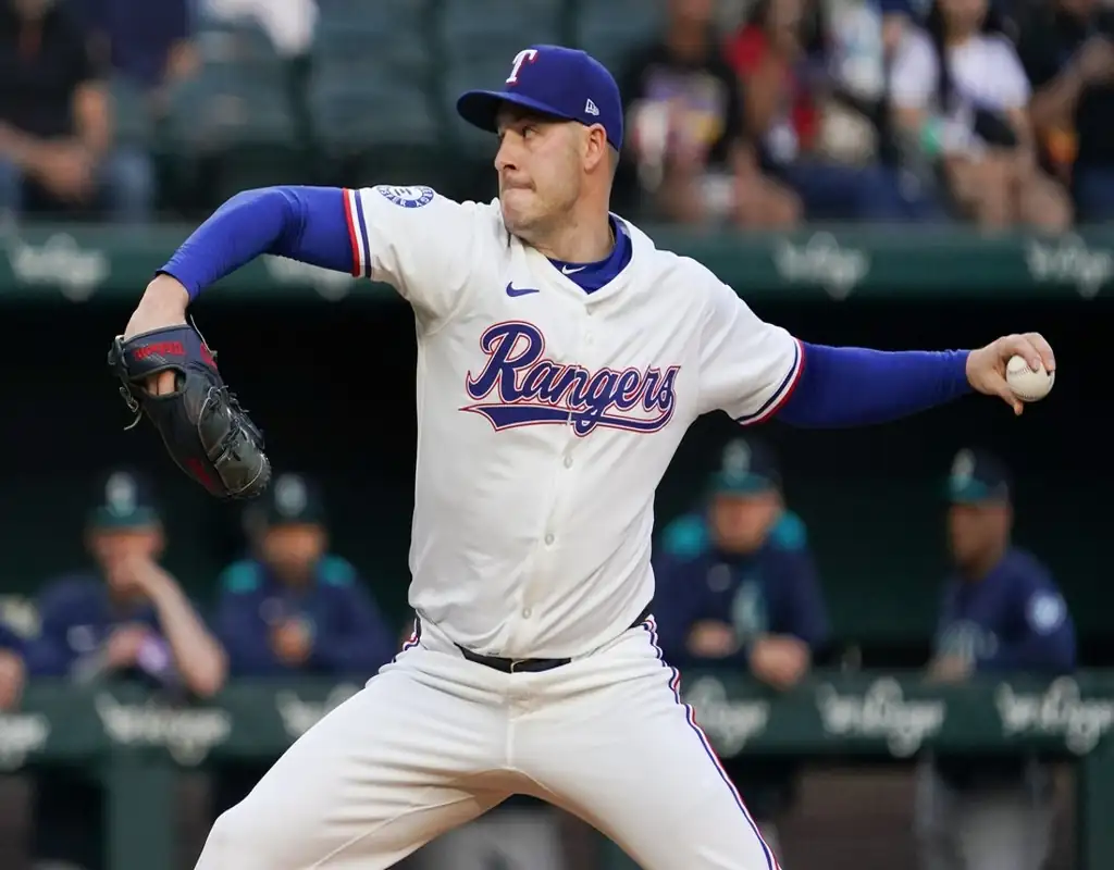 Texas Rangers pitcher delivers a pitch during May 14, 2025 MLB matchup vs Colorado Rockies