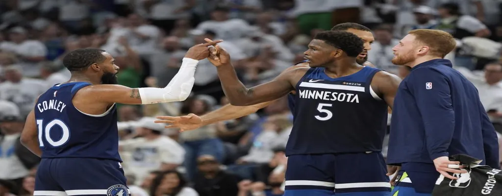 Oklahoma City Thunder vs Minnesota Timberwolves Picks and Predictions May 20th 2025 2 Minnesota Timberwolves players fist bump during NBA game