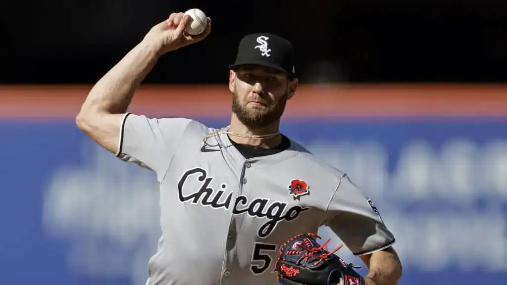 Texas Rangers vs Chicago White Sox Picks and Predictions June 13th 2025 2 A Chicago White Sox pitcher in a gray uniform winds up to throw a baseball on a warm day at the ballpark.