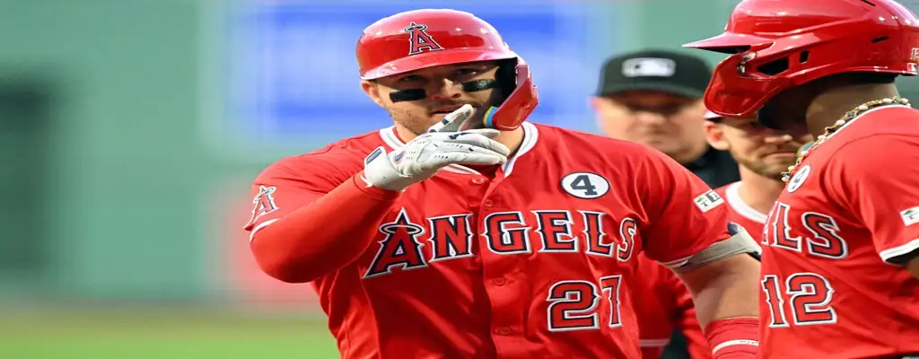 Los Angeles Angels vs Washington Nationals Picks and Predictions June 28th 2025 3 Los Angeles Angels player points to teammates after a clutch hit in red uniform