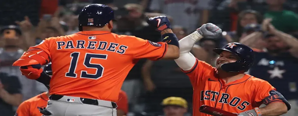 Houston Astros vs Chicago Cubs Picks and Predictions June 27th 2025 3 Houston Astros players celebrate after scoring during a baseball game
