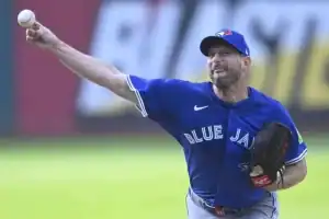 A Toronto Blue Jays pitcher throws a pitch during a game.