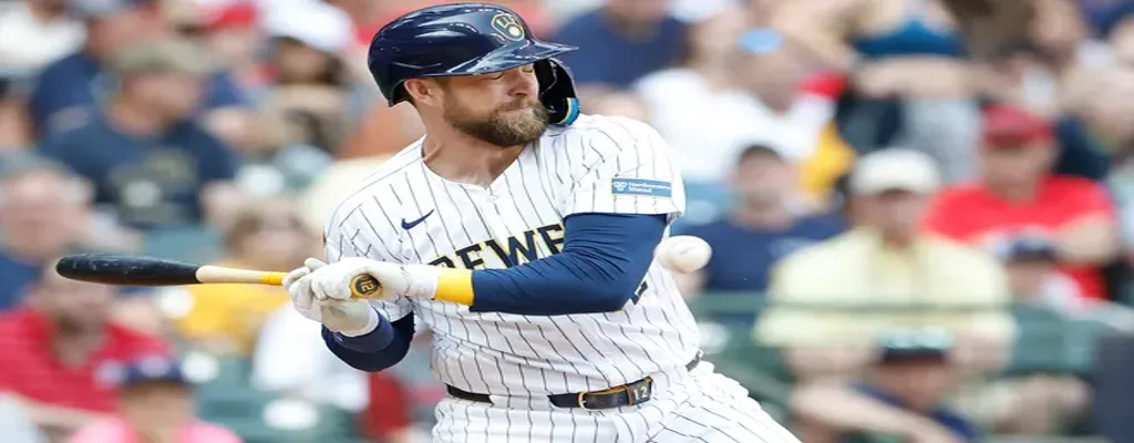 Milwaukee Brewers vs Colorado Rockies Picks and Predictions June 27th 2025 3 Milwaukee Brewers player gets hit by pitch during a swing attempt